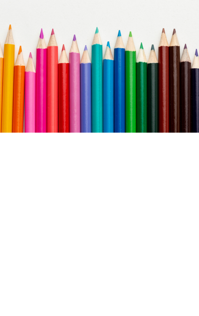 Row of colored pencils pointing upward featuring all different colors