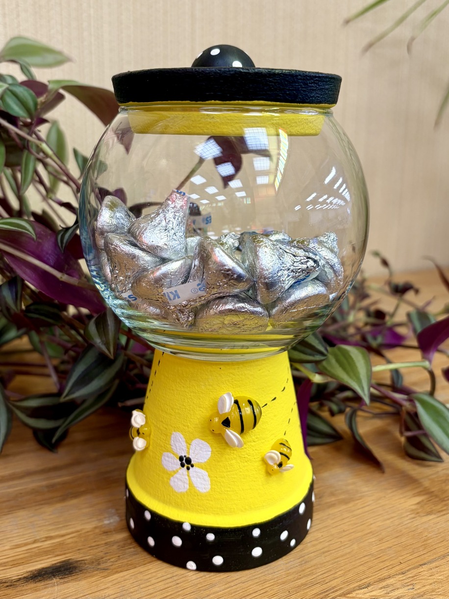 Black and Yellow candy jar with bees glued to the sides
